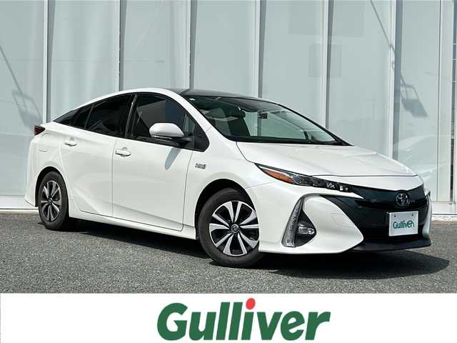 トヨタ プリウス ＰＨＶ S 福岡県 2017(平29)年 8.7万km ホワイトパールクリスタルシャイン ・充電ケーブル付き/・太陽光パネル/・7インチ純正ナビ/（BLUETOOTH/フルセグ/バックカメラ/・ワンオーナー/・ETC/・ドライブレコーダー/・プラグインハイブリッド/・スペアキー/・クルーズコントロール/・USB入力端子/・純正アルミホイール/・フロアマット/・シートヒーター/・横滑り防止装置/・レーンキープアシスト/・コーナーセンサー/・電動格納ミラー/・ドライブモード/・保証書/・取扱説明書