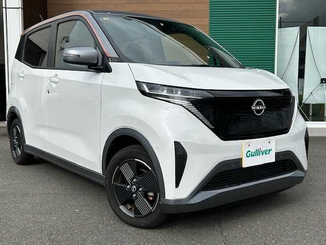 日産 サクラ X 静岡県 2023(令5)年 0.5万km チタニウムグレーM/シルキーホワイト 純正メモリナビ/AM/FM/CD/DVD/BT/フルセグ/ソナーセンサー/スマートキー/プッシュスタート/純正フロアマット/オートホールド/オートライト/LEDヘッドライト