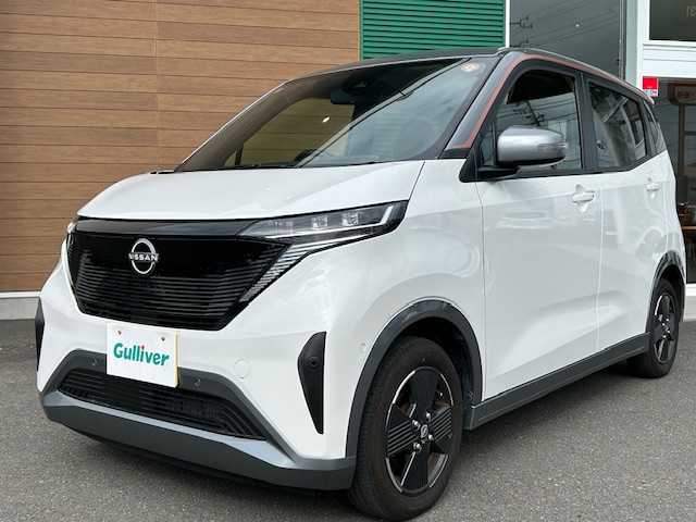 日産 サクラ X 静岡県 2023(令5)年 0.5万km チタニウムグレーM/シルキーホワイト 純正メモリナビ/AM/FM/CD/DVD/BT/フルセグ/ソナーセンサー/スマートキー/プッシュスタート/純正フロアマット/オートホールド/オートライト/LEDヘッドライト