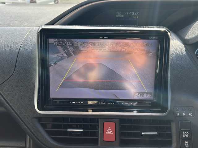 トヨタ ヴォクシー ZS 煌 愛知県 2015(平27)年 10.1万km ホワイトパールクリスタルシャイン 登録時走行距離100531km/社外8インチSDナビ/（フルセグTV/DVD/AM/FM/Bluetooth）/バックカメラ/アイドリングストップ/プッシュスタート/スマートキー/（スペアキー×１）/両側パワースライドドア/ビルドインETC/ドアバイザー/純正フロアマット/フォグランプ/オートライト/取説/保証書