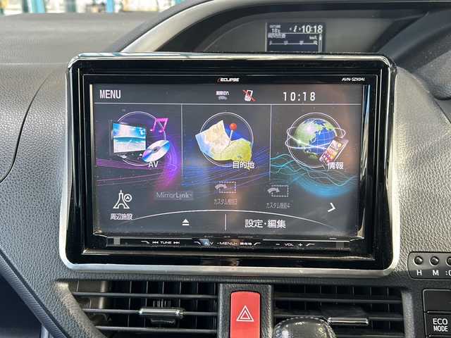 トヨタ ヴォクシー ZS 煌 愛知県 2015(平27)年 10.1万km ホワイトパールクリスタルシャイン 登録時走行距離100531km/社外8インチSDナビ/（フルセグTV/DVD/AM/FM/Bluetooth）/バックカメラ/アイドリングストップ/プッシュスタート/スマートキー/（スペアキー×１）/両側パワースライドドア/ビルドインETC/ドアバイザー/純正フロアマット/フォグランプ/オートライト/取説/保証書