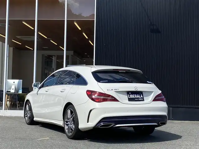 メルセデス・ベンツ ＣＬＡ１８０ Sブレイク　スポーツ 福岡県 2016(平28)年 9.4万km カルサイトホワイト AMGライン/AMGスポーツステアリング/18インチアルミホイール/ベーシックパッケージ/シートヒーター/レーダーセーフティパッケージ/ブラインドスポット/レーンキープ/純正ナビ/CD/DVD/ETC/黒半革シート/パワーシート/メモリーシート/LEDヘッドライト/スマートキー/保証書/取扱説明書