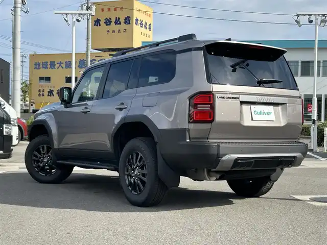 トヨタ ランドクルーザー ２５０ VX 愛媛県 2024(令6)年 0.5万km アバンギャルドブロンズメタリック トヨタセーフティセンス/純正ナビ（FM/AM/フルセグTV/Bluetooth）/バックカメラ/ETC2.0/クルーズコントロール/アイドリングストップ/サンルーフ/パワーバックドア/パワーシート/シートヒーター/横滑り防止装置/コーナーセンサー/レーンキープアシスト/オートライト/オートマチックハイビーム