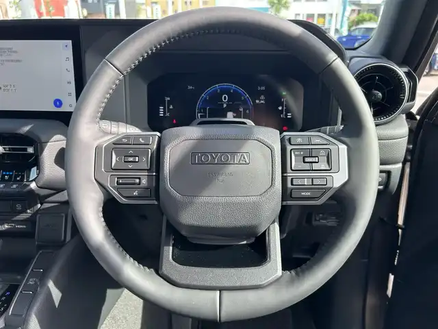 トヨタ ランドクルーザー ２５０ VX 愛媛県 2024(令6)年 0.5万km アバンギャルドブロンズメタリック トヨタセーフティセンス/純正ナビ（FM/AM/フルセグTV/Bluetooth）/バックカメラ/ETC2.0/クルーズコントロール/アイドリングストップ/サンルーフ/パワーバックドア/パワーシート/シートヒーター/横滑り防止装置/コーナーセンサー/レーンキープアシスト/オートライト/オートマチックハイビーム