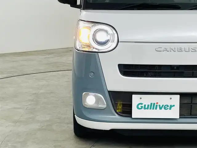 ダイハツ ムーヴ キャンバス ストライプス G 福島県 2023(令5)年 1.3万km シャイニングホワイトパール/レイクブルーメタリック スマートアシスト/・先行車発進お知らせ機能/・標識認識機能/・両側パワースライドドア/両側パワースライドドア/LEDオートライト/・フォグランプ/ベンチシート/・シートヒーター/ステアリングリモコン/電子パーキング/・ブレーキホールド/純正フロアマット/電動格納ドアミラー/アイドリングストップ/プッシュスタート/・スマートキー/・スペアキー