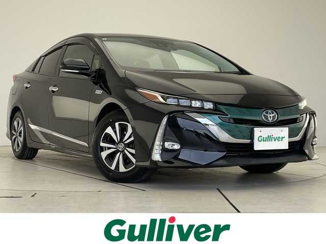 トヨタ プリウス ＰＨＶ A プレミアム 愛知県 2017(平29)年 7.7万km アティチュードブラックマイカ プレミアムサウンドＪＢＬ/純正11.6型ディスプレイオーディオナビ/四眼LEDヘッドライト/シートヒーター/バックカメラ/パワーシート/ヘッドアップディスプレイ/コーナーセンサー/ETC2.0/ブラインドスポットモニター/LEDヘッドライト/ステアリングヒーター/レーンキープアシスト/オートマチックハイビーム/衝突軽減システム/ステアリングスイッチ/スマートキー/プッシュスタート