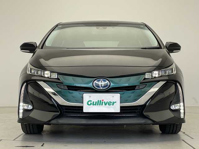 トヨタ プリウス ＰＨＶ A プレミアム 愛知県 2017(平29)年 7.7万km アティチュードブラックマイカ プレミアムサウンドＪＢＬ/純正11.6型ディスプレイオーディオナビ/四眼LEDヘッドライト/シートヒーター/バックカメラ/パワーシート/ヘッドアップディスプレイ/コーナーセンサー/ETC2.0/ブラインドスポットモニター/LEDヘッドライト/ステアリングヒーター/レーンキープアシスト/オートマチックハイビーム/衝突軽減システム/ステアリングスイッチ/スマートキー/プッシュスタート