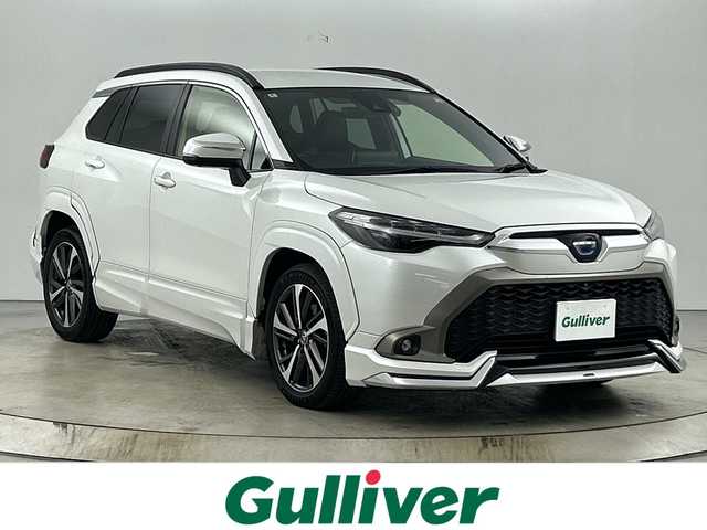 トヨタ カローラ クロス ハイブリッド Z 愛知県 2022(令4)年 3万km プラチナホワイトパールマイカ 禁煙車/ワンオーナー/純正9インチナビ/（CD/DVD/Bluetooth/フルセグTV/USB)/全方位カメラ/モデリスタエアロ/（フロント/リア/サイド）/シーケンシャルウインカー/トヨタセーフティセンス/・プリクラッシュセーフティ/・レーダークルーズコントロール/・レーントレーシングアシスト/・オートマチックハイビーム/・クリアランスソナー/・パーキングサポートブレーキ/・ロードサインアシスト/・ブラインドスポットモニター/ETC2.0/ドライブレコーダー/ハーフレザーシート/シートヒーター/パワーシート/パワーバックドア/ルーフレール/純正18インチアルミホイール/スマートキー/スペアキー1本/プッシュスタート/LEDヘッドライト/フロントフォグランプ/オートライト/純正フロアマット/電子パーキングブレーキ/オートホールド/横滑り防止装置