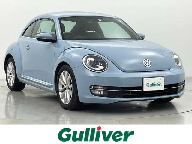 フォルクスワーゲン ザ・ビートル デザイン レザーパッケージ 熊本県 2013(平25)年 5万km デニムブルー 社外ナビAVIC-MRZ009（ＣＤ・ＤＶＤ・フルセグ・ＢＴ・ＳＤ・ｉｐｏｄ・ＵＳＢ）/クルーズコントロール　/前席シートヒーター　/ＥＴＣ　/横滑り防止　/純正フロアマット　/純正１７インチＡＷ/フォグライト/リモコンキー/スペアキー1本/保証書　/取扱説明書
