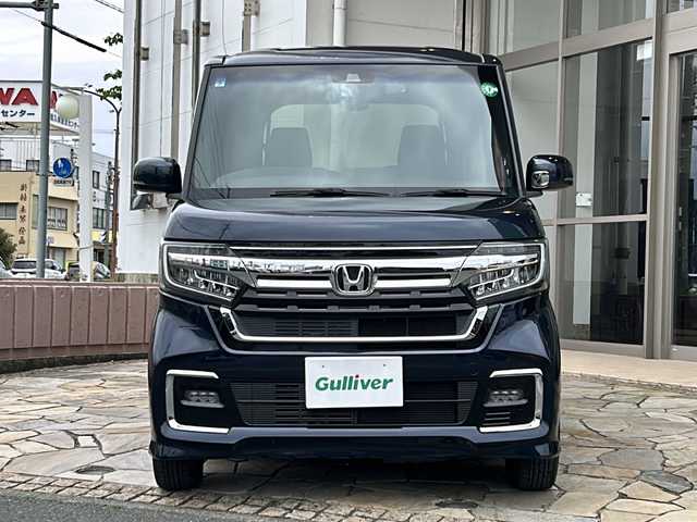 ホンダ Ｎ ＢＯＸ カスタム L 静岡県 2021(令3)年 2.3万km ミッドナイトブルービームM 純正ナビ/・バックカメラ/・Bluetooth/・CD/DVD/・フルセグTV/・USB/・SD/・ステアリングスイッチ/主要装備/・プッシュスタート/・片側パワースライドドア/・ETC車載器/・ドライブレコーダー/・LEDヘッドライト/・前席シートヒーター/・サイドエアバッグ＋カーテンエアバッグ/・後席サンシェード/・運転席＋助手席バックテーブル/・TVキャンセラー/・スマートキー/・アイドリングストップ/・コーナーセンサー/・社外ＡＷ/・純正フロアマット/ホンダセンシング/・衝突軽減ブレーキ/・車線維持支援システム/・アダプティブクルーズコントロール/・誤発進抑制機能/・歩行者事故低減ステアリング/・路外逸脱抑制機能/・先行車発進お知らせ機能/・標識認識機能/・オートマチックハイビーム