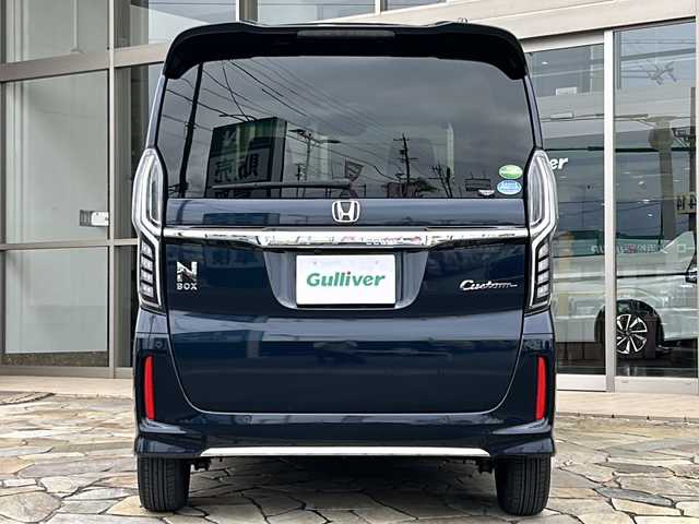 ホンダ Ｎ ＢＯＸ カスタム L 静岡県 2021(令3)年 2.3万km ミッドナイトブルービームM 純正ナビ/・バックカメラ/・Bluetooth/・CD/DVD/・フルセグTV/・USB/・SD/・ステアリングスイッチ/主要装備/・プッシュスタート/・片側パワースライドドア/・ETC車載器/・ドライブレコーダー/・LEDヘッドライト/・前席シートヒーター/・サイドエアバッグ＋カーテンエアバッグ/・後席サンシェード/・運転席＋助手席バックテーブル/・TVキャンセラー/・スマートキー/・アイドリングストップ/・コーナーセンサー/・社外ＡＷ/・純正フロアマット/ホンダセンシング/・衝突軽減ブレーキ/・車線維持支援システム/・アダプティブクルーズコントロール/・誤発進抑制機能/・歩行者事故低減ステアリング/・路外逸脱抑制機能/・先行車発進お知らせ機能/・標識認識機能/・オートマチックハイビーム