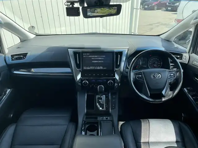 トヨタ アルファード S Cパッケージ 富山県 2018(平30)年 6.3万km ダークレッドマイカメタリック 純正10型ナビ(BT/CD/DVD)/フルセグTV/パワースライドドア(両側)/パワーバックドア/バックカメラ/ビルトインETC/コムテックドライブレコーダー/純正12.1型後席ディスプレイ/レーダークルーズコントロール/インテリジェントクリアランスソナー/セーフティセンス/・プリクラッシュセーフティ/・レーントレーシングアシスト/・ロードサインアシスト/・アダプティブハイビームシステム/ブラインドスポットモニター/デジタルインナーミラー/純正3眼LEDヘッドランプ/デュアルオートエアコン/木目調/革巻きコンビステアリング/ステアリングヒーター/ブラック合皮シート/前列パワーシート/快適温熱シート/2列目エグゼクティブパワーシート/助手席パワーオットマン/運転席ポジションメモリー/モデリスタエアロ(F/S/R)/純正18インチアルミホイール/スマートエントリー/プッシュスタートシステム/ウェルカムパワースライドドア機能/禁煙車