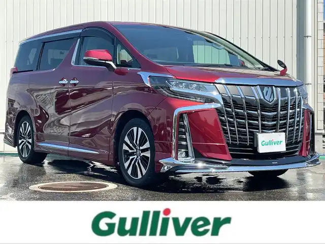 トヨタ アルファード S Cパッケージ 富山県 2018(平30)年 6.3万km ダークレッドマイカメタリック 純正10型ナビ(BT/CD/DVD)/フルセグTV/パワースライドドア(両側)/パワーバックドア/バックカメラ/ビルトインETC/コムテックドライブレコーダー/純正12.1型後席ディスプレイ/レーダークルーズコントロール/インテリジェントクリアランスソナー/セーフティセンス/・プリクラッシュセーフティ/・レーントレーシングアシスト/・ロードサインアシスト/・アダプティブハイビームシステム/ブラインドスポットモニター/デジタルインナーミラー/純正3眼LEDヘッドランプ/デュアルオートエアコン/木目調/革巻きコンビステアリング/ステアリングヒーター/ブラック合皮シート/前列パワーシート/快適温熱シート/2列目エグゼクティブパワーシート/助手席パワーオットマン/運転席ポジションメモリー/モデリスタエアロ(F/S/R)/純正18インチアルミホイール/スマートエントリー/プッシュスタートシステム/ウェルカムパワースライドドア機能/禁煙車