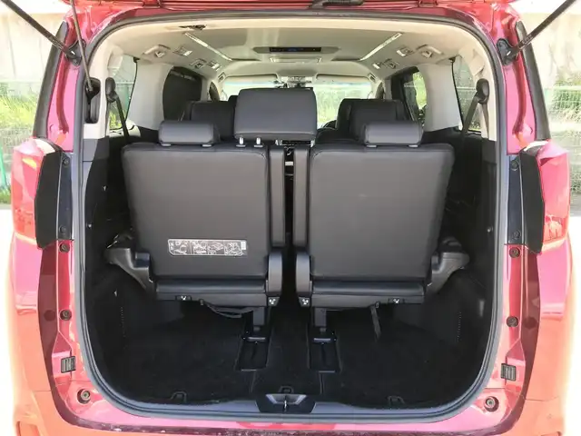 トヨタ アルファード S Cパッケージ 富山県 2018(平30)年 6.3万km ダークレッドマイカメタリック 純正10型ナビ(BT/CD/DVD)/フルセグTV/パワースライドドア(両側)/パワーバックドア/バックカメラ/ビルトインETC/コムテックドライブレコーダー/純正12.1型後席ディスプレイ/レーダークルーズコントロール/インテリジェントクリアランスソナー/セーフティセンス/・プリクラッシュセーフティ/・レーントレーシングアシスト/・ロードサインアシスト/・アダプティブハイビームシステム/ブラインドスポットモニター/デジタルインナーミラー/純正3眼LEDヘッドランプ/デュアルオートエアコン/木目調/革巻きコンビステアリング/ステアリングヒーター/ブラック合皮シート/前列パワーシート/快適温熱シート/2列目エグゼクティブパワーシート/助手席パワーオットマン/運転席ポジションメモリー/モデリスタエアロ(F/S/R)/純正18インチアルミホイール/スマートエントリー/プッシュスタートシステム/ウェルカムパワースライドドア機能/禁煙車