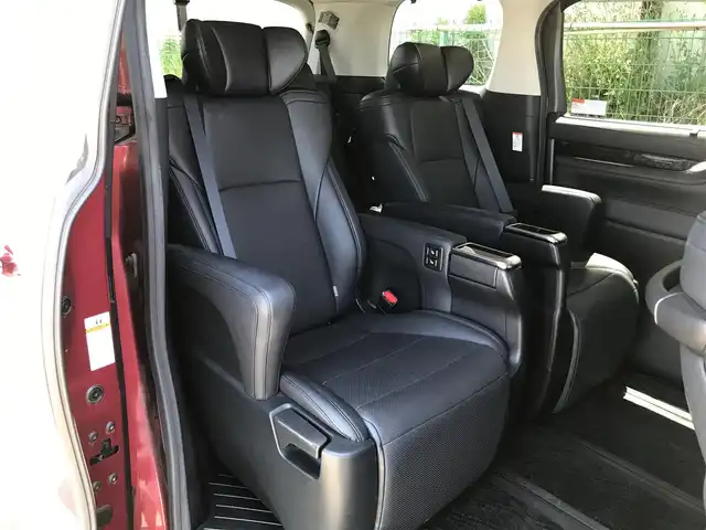 トヨタ アルファード S Cパッケージ 富山県 2018(平30)年 6.3万km ダークレッドマイカメタリック 純正10型ナビ(BT/CD/DVD)/フルセグTV/パワースライドドア(両側)/パワーバックドア/バックカメラ/ビルトインETC/コムテックドライブレコーダー/純正12.1型後席ディスプレイ/レーダークルーズコントロール/インテリジェントクリアランスソナー/セーフティセンス/・プリクラッシュセーフティ/・レーントレーシングアシスト/・ロードサインアシスト/・アダプティブハイビームシステム/ブラインドスポットモニター/デジタルインナーミラー/純正3眼LEDヘッドランプ/デュアルオートエアコン/木目調/革巻きコンビステアリング/ステアリングヒーター/ブラック合皮シート/前列パワーシート/快適温熱シート/2列目エグゼクティブパワーシート/助手席パワーオットマン/運転席ポジションメモリー/モデリスタエアロ(F/S/R)/純正18インチアルミホイール/スマートエントリー/プッシュスタートシステム/ウェルカムパワースライドドア機能/禁煙車