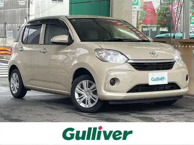 トヨタ パッソ X Lパッケージ 愛知県 2021(令3)年 1.8万km キナコメタリック 純正SDナビ〈NSCN-W68〉/・CD／Bluetooth／1segTV/バック／全周囲カメラ/スマートアシストIII/・衝突警報機能/・衝突回避支援ブレーキ機能/・誤発進抑制制御機能/・車線逸脱警報機能/・先行車発進お知らせ機能/・オートハイビーム/ETC/オートライト/LEDヘッドライト/コーナーセンサー/スマートキー