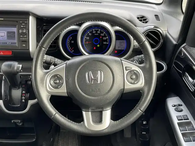 ホンダ Ｎ ＢＯＸ カスタム G ターボ Lパッケージ 岡山県 2015(平27)年 6.3万km プレミアムホワイトパールⅡ 登録時走行距離62931km/エアロ（サイド/リア）/社外ナビ/(AM/FM/TV/DISC/USB)/衝突軽減ブレーキシステム/アイドリングストップ/パドルシフト/両側パワースライドドア/クルーズコントロール/ETC/ドライブレコーダー/バックカメラ/スペアキー×1/スマートキー/プッシュスタート/電動格納ミラー/純正15インチアルミホイール