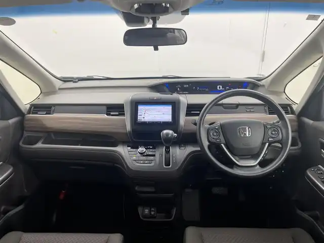 ホンダ フリード G 茨城県 2024(令6)年 1.2万km フィヨルドミストパール 社外ナビ（AVIC-RZ812）/フルセグTV/Bluetooth/バックカメラ/ETC/追従クルーズコントロール/両側パワースライドドア/シートヒーター/レーンアシスト/コーナーセンサー/衝突軽減ブレーキ/横滑り防止装置/ステアリングリモコン/アイドリングストップ