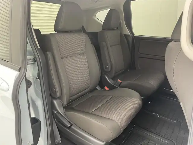 ホンダ フリード G 茨城県 2024(令6)年 1.2万km フィヨルドミストパール 社外ナビ（AVIC-RZ812）/フルセグTV/Bluetooth/バックカメラ/ETC/追従クルーズコントロール/両側パワースライドドア/シートヒーター/レーンアシスト/コーナーセンサー/衝突軽減ブレーキ/横滑り防止装置/ステアリングリモコン/アイドリングストップ