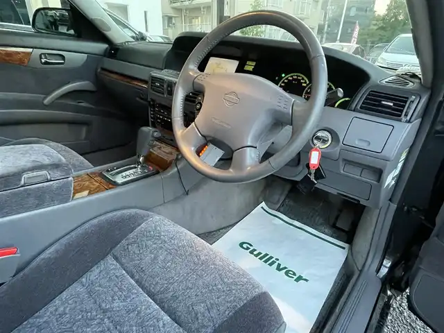日産 グロリア アルティマ 埼玉県 2000(平12)年 8.5万km ダークグレー アルティマターボ/純正ナビ/AM/FM/DVD・CD/MD/純正CDチェンジャー/ETC/前席パワーシート/純正AW/オートライト/フォグライト/社外盗難防止装置/業者施工の内外装仕上済/取扱説明書