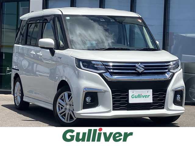 スズキ ソリオ HV MZ 道南・函館 2023(令5)年 0.7万km ピュアホワイトP 純正ナビ/フルセグＴＶ/衝突軽減ブレーキ/夏冬タイヤ/エンジンスターター/バックカメラ/ドライブレコーダー/シートヒーター/両側パワースライドドア/ＨＵＤ/クルーズコントロール/コーナーセンサー