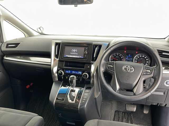 トヨタ アルファード S Aパッケージ 長野県 2017(平29)年 4.5万km ホワイトパールクリスタルシャイン 4WD/純正ナビ/バックカメラ/Bluetooth/CD/DVD/フルセグTV/ETC/TVキャンセラー/衝突被害軽減システム/横滑り防止装置/クルーズコントロール（追従走行無し）/前後コーナーセンサー/MTモード付きAT/両側パワースライドドア/ウォークスルー/オットマン/3列シート/LEDヘッドライト/オートライト/フォグランプ/純正フロアマット/純正18インチアルミホイール/スマートキー