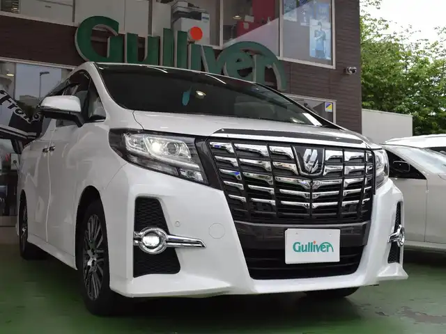 トヨタ アルファード SA Cパッケージ 神奈川県 2016(平28)年 6.6万km ホワイトパールクリスタルシャイン メーカーOPナビ/(フルセグTV/Bluetooth/CD/DVD/SD)/JBLサウンドシステム/純正フリップダウンモニター/サンルーフ/両側パワースライドドア/レーダークルーズコントロール/クリアランスソナー/レーントレーシングアシスト/シートメモリー機能付き/電動リアゲート/ウッドコンビステアリング/純正18アルミホイール/ステアリングリモコン/ハンドルヒーター/シートヒーター(D/N)/オートライト/オートハイビーム/ビルトインETC/前方ドラレコ/１００V電源/プッシュスタート/ドアバイザー/スマートキー