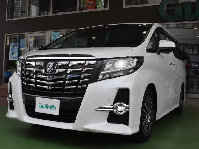 トヨタ アルファード SA Cパッケージ 神奈川県 2016(平28)年 6.6万km ホワイトパールクリスタルシャイン メーカーOPナビ/(フルセグTV/Bluetooth/CD/DVD/SD)/JBLサウンドシステム/純正フリップダウンモニター/サンルーフ/両側パワースライドドア/レーダークルーズコントロール/クリアランスソナー/レーントレーシングアシスト/シートメモリー機能付き/電動リアゲート/ウッドコンビステアリング/純正18アルミホイール/ステアリングリモコン/ハンドルヒーター/シートヒーター(D/N)/オートライト/オートハイビーム/ビルトインETC/前方ドラレコ/１００V電源/プッシュスタート/ドアバイザー/スマートキー