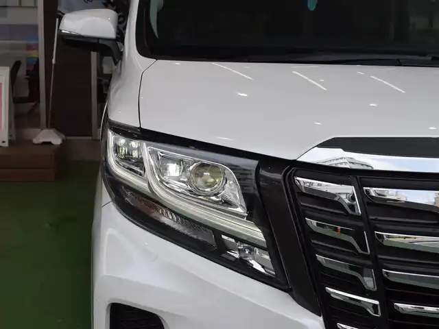 トヨタ アルファード SA Cパッケージ 神奈川県 2016(平28)年 6.6万km ホワイトパールクリスタルシャイン メーカーOPナビ/(フルセグTV/Bluetooth/CD/DVD/SD)/JBLサウンドシステム/純正フリップダウンモニター/サンルーフ/両側パワースライドドア/レーダークルーズコントロール/クリアランスソナー/レーントレーシングアシスト/シートメモリー機能付き/電動リアゲート/ウッドコンビステアリング/純正18アルミホイール/ステアリングリモコン/ハンドルヒーター/シートヒーター(D/N)/オートライト/オートハイビーム/ビルトインETC/前方ドラレコ/１００V電源/プッシュスタート/ドアバイザー/スマートキー