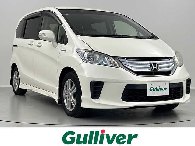 ホンダ フリード ハイブリット ジャストセレクション 福島県 2012(平24)年 7.1万km プレミアムホワイトパール /社外SDナビ//Bluetooth//フルセグテレビ//クルーズコントロール(追従無)//横滑り防止装置//盗難防止装置//ホイール付スタットレスタイヤ積載//社外アルミホイール//ETC//オートライト//アイドリングストップ//スペアキー