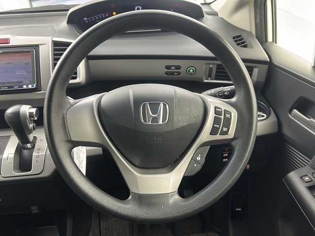 ホンダ フリード ハイブリット ジャストセレクション 福島県 2012(平24)年 7.1万km プレミアムホワイトパール /社外SDナビ//Bluetooth//フルセグテレビ//クルーズコントロール(追従無)//横滑り防止装置//盗難防止装置//ホイール付スタットレスタイヤ積載//社外アルミホイール//ETC//オートライト//アイドリングストップ//スペアキー