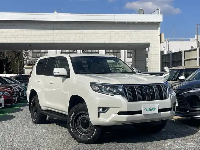 トヨタ ランドクルーザー プラド TX 兵庫県 2019(令1)年 3.7万km ホワイトパールクリスタルシャイン ・ワンオーナー/・TOYO OPEN COUNTRY　R/T/オールテレーンタイヤ　ホワイトレター/・メーカーOP サンルーフ/・ウッドコンビステアリング/・純正ナビ/・TV/BT/USB/HDMI/・バックカメラ/・ステアリングリモコン/・TVキャンセラー/・ビルトインETC/・プリクラッシュセーフティ/・レーンディパーチャーアラート/・オートマチックハイビーム/・クリアランスソナー/・オートLEDヘッドランプ/・LEDフォグランプ/・ドライブレコーダー前後/・トノカバー