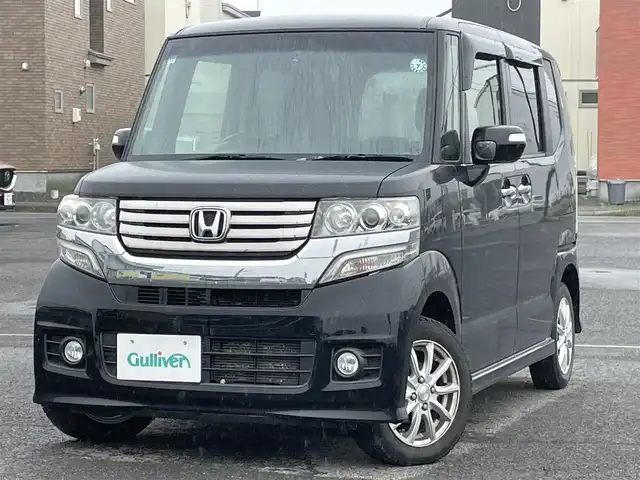 ホンダ Ｎ ＢＯＸ カスタム G SSパッケージ 道央・札幌 2013(平25)年 7万km クリスタルブラックパール ４WD/社外メモリーナビ/CD/DVD/SD/フルセグ/社外フリップダウンモニター/横滑り防止装置/バックカメラ/ドライブレコーダー/ECONモード/両側パワースライドドア/革巻きステアリング/ステアリングリモコン/プッシュスタート/スマートキー/LEDヘッドライト/オートライト/フォグランプ/電動格納ミラー/ヒーテッドドアミラー/ウィンカーミラー/純正フロアマット/ドアバイザー/スペアキー/社外エンジンスターター