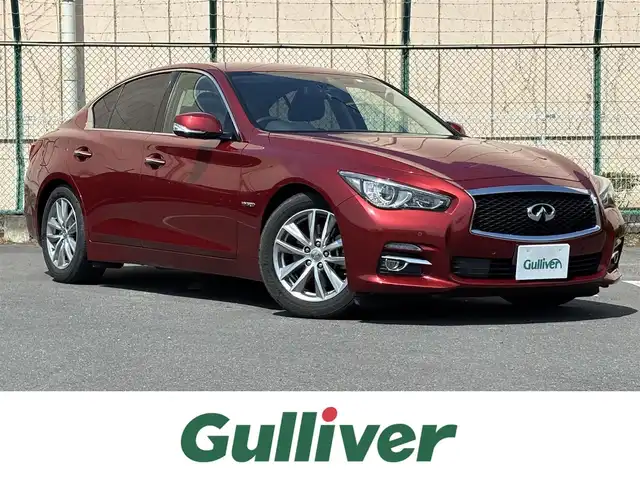 日産 スカイライン ハイブリッド 350GT Type P 東京都 2016(平28)年 5.3万km ラディアントレッド 純正ナビ　/全周囲カメラ　/ドライブレコーダー/アダプティブクルーズコントロール　/パワーシート　/ヒートシーター　/シートポジションメモリー　/エマージェンシーブレーキ　/ドライブモード　/横滑り制御機能　/プッシュスタート　/ＥＴＣ/オートアウェイ機能/電動チルト&テレスコ調整