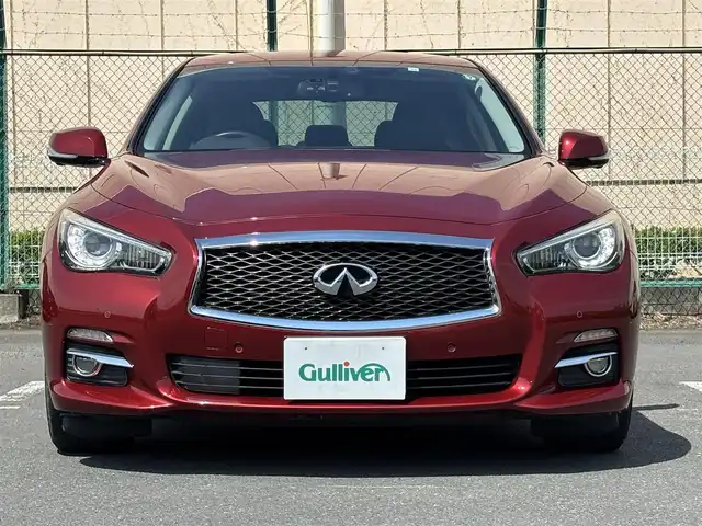 日産 スカイライン ハイブリッド 350GT Type P 東京都 2016(平28)年 5.3万km ラディアントレッド 純正ナビ　/全周囲カメラ　/ドライブレコーダー/アダプティブクルーズコントロール　/パワーシート　/ヒートシーター　/シートポジションメモリー　/エマージェンシーブレーキ　/ドライブモード　/横滑り制御機能　/プッシュスタート　/ＥＴＣ/オートアウェイ機能/電動チルト&テレスコ調整