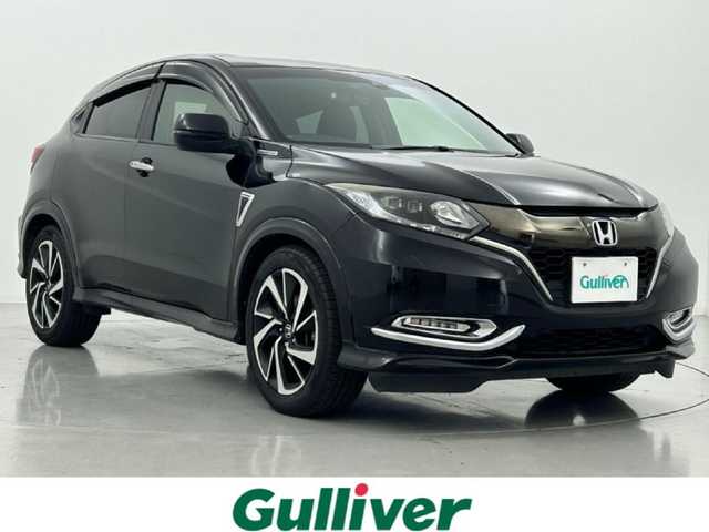 ホンダ ヴェゼル ハイブリッド RS ホンダセンシング 熊本県 2017(平29)年 7.8万km クリスタルブラックパール 純正ナビVXM-185VFNi（ＣＤ・ＤＶＤ・フルセグ・ＢＴ・ＳＤ・ｉｐｏｄ）/バックカメラ　/純正前方ドライブレコーダー　/ビルトインＥＴＣ　/前席シートヒーター　/純正フロントエアロ　/ホンダセンシング/・衝突軽減ブレーキ/・レーダークルーズコントロール/・レーンキープアシスト/・先行車発進お知らせ機能/・路外逸脱制御機能/・標識認識システム/横滑り防止/オートブレーキホールド/パドルシフト/ドアバイザー/ハーフレザーシート/純正フロアマット/純正１８インチAW/オートライト/LEDヘッドライト/フォグライト/スマートキー/プッシュスタート/スペアキー1本/取扱説明書