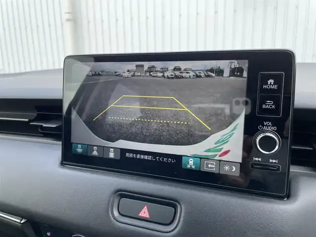 ホンダ ヴェゼル ハイブリッド e:HEV Z 熊本県 2022(令4)年 3万km パール 純正ナビ　BT/USB/AM/FM/フルセグTV/バックカメラ/ホンダセンシング/パワーテールゲート/オートクルーズコントロール/本革巻きステアリング/・ステアリングヒーター/・ステアリングリモコン/・パドルシフト/ビルトインETC2.0/電子パーキング/・オートブレーキホールド/ハーフレザーシート/・D/Nシートヒーター/LEDヘッドライト/・オートライト/プッシュスタート/・スマートキー/・スペアキー×１/ウインカーミラー/・電動格納ミラー