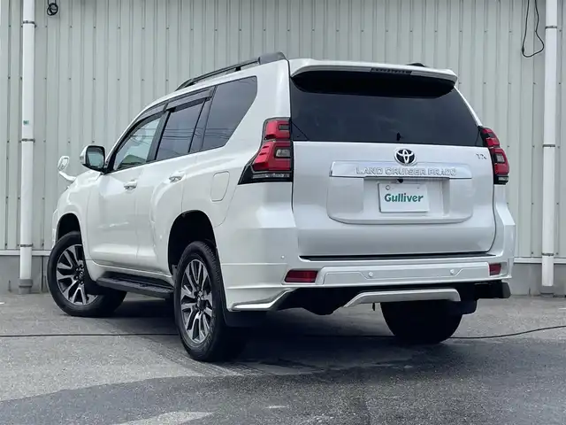 トヨタ ランドクルーザー プラド TX Lパッケージ 山形県 2022(令4)年 3.1万km ホワイトパールクリスタルシャイン MODELLISTAエアロ/7人乗り/4WD/セーフティセンス/サンルーフ/純正ナビ/　【CD SD BT】/ワンセグTV/バックカメラ/ステアリングスイッチ/レーダークルーズコントロール/レザーシート/シートヒーター/エアシート/横滑り防止装置/コーナーセンサー/LEDライト/フォグランプ/ウィンカーミラー/純正フロアマット/ドアバイザー/純正19インチAW