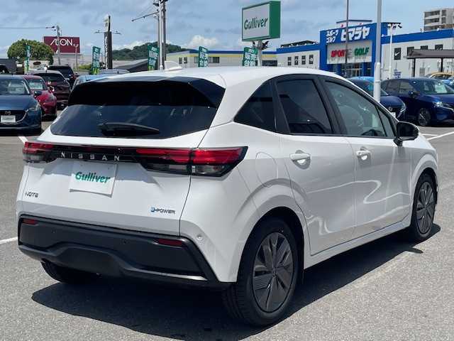 日産 ノート X 長崎県 2023(令5)年 6.7万km ピュアホワイトパール 純正メモリーナビ/BT/USB/HDMI/フルセグTV/アラウンドビューモニター/エマージェンシーブレーキ/プロパイロット/デジタルインナーミラー/ステアリングスイッチ/ハンドル支援/オートマチックハイビーム/コーナーセンサー前後/ビルトインETC2.0/スマートキー×2