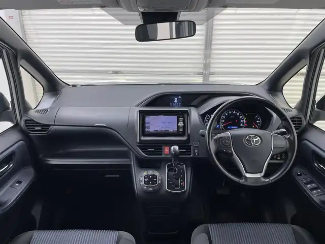 トヨタ ヴォクシー ZS 煌 茨城県 2016(平28)年 8.6万km アイスチタニウムマイカメタリック 純正ナビ/バックカメラ/フルセグ/衝突被害軽減ブレーキ/車線逸脱抑制装置/オートマチックハイビーム/両側電動スライドドア/ETC/純正16インチAW/LEDヘッドライト/スマートキー