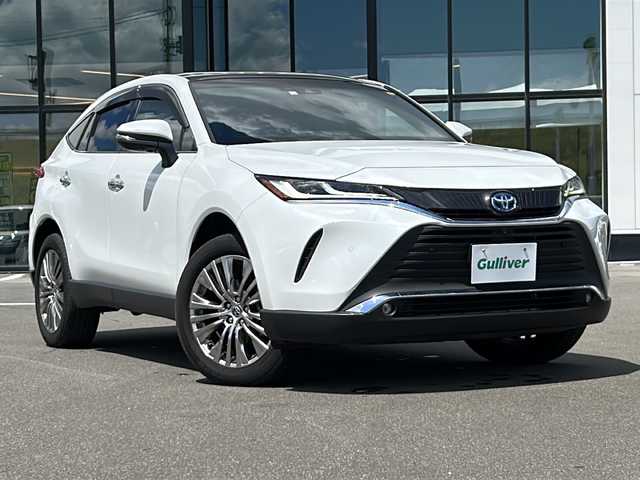 トヨタ ハリアー ハイブリッド Z レザーパッケージ 青森県 2023(令5)年 1.3万km プラチナホワイトパールマイカ ・4WD/・純正ディスプレイオーディオナビ/・プレミアムJBLサウンド/・フルセグ/Bluetooth/・全方位モニター/・デジタルインナーミラー/・ガラスルーフ/・本革シート(黒)/・シートヒーター/・エアシート/・衝突軽減ブレーキ/・ブラインドスポットモニター/・レーンキープアシスト/・レーダークルーズコントロール/・前後コーナーセンサー/・パワーバックドア/・置くだけ充電/・ステリングヒーター/・純正LEDヘッドライト/・オートマチックハイビーム/・ETC/・スマートキー/・プッシュスタート/・純正19インチAW/・スペアキー/・保証書・取説あり