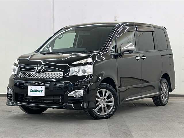 トヨタ ヴォクシー ZS 煌Ⅱ 道央・札幌 2012(平24)年 8万km ブラック /社外ディスプレイオーディオ//バックカメラ//フリップダウンモニター//両側パワースライドドア//ETC//プッシュスタート//オートライト//純正フロアマット//純正ドアバイザー//ダブルエアバック