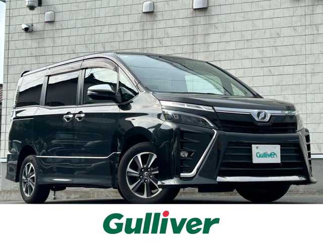 トヨタ ヴォクシー ZS 煌 山形県 2018(平30)年 12.2万km イナズマスパーキングブラックガラスフレーク 4WD/純正SDナビ/・Bluetooth/・フルセグテレビ/両側パワースライドドア/バックカメラ/デュアルエアコン/純正アルミホイール/クルーズコントロール/ETC2.0/アイドリングストップ/横滑り防止装置/レーンキープアシスト/オートライト/ハイビーム/盗難防止装置/衝突被害軽減システム