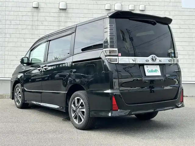 トヨタ ヴォクシー ZS 煌 山形県 2018(平30)年 12.2万km イナズマスパーキングブラックガラスフレーク 4WD/純正SDナビ/・Bluetooth/・フルセグテレビ/両側パワースライドドア/バックカメラ/デュアルエアコン/純正アルミホイール/クルーズコントロール/ETC2.0/アイドリングストップ/横滑り防止装置/レーンキープアシスト/オートライト/ハイビーム/盗難防止装置/衝突被害軽減システム