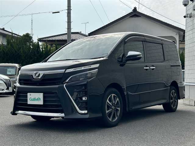 トヨタ ヴォクシー ZS 煌 山形県 2018(平30)年 12.2万km イナズマスパーキングブラックガラスフレーク 4WD/純正SDナビ/・Bluetooth/・フルセグテレビ/両側パワースライドドア/バックカメラ/デュアルエアコン/純正アルミホイール/クルーズコントロール/ETC2.0/アイドリングストップ/横滑り防止装置/レーンキープアシスト/オートライト/ハイビーム/盗難防止装置/衝突被害軽減システム