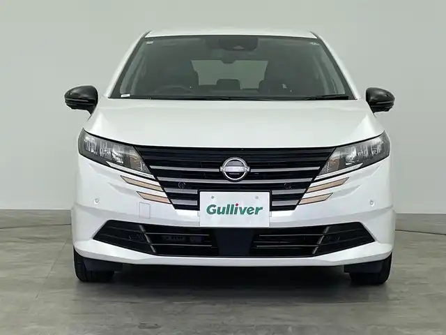 日産 ノート X 90周年記念車 群馬県 2024(令6)年 0.9万km ピュアホワイトパール 禁煙車　純正ナビ　Bluetooth　フルセグ　全方位カメラ　ブラインドスポットモニター　衝突軽減システム　オートマチックハイビーム　コーナーセンサー　LED　プッシュスタート　スマートキー