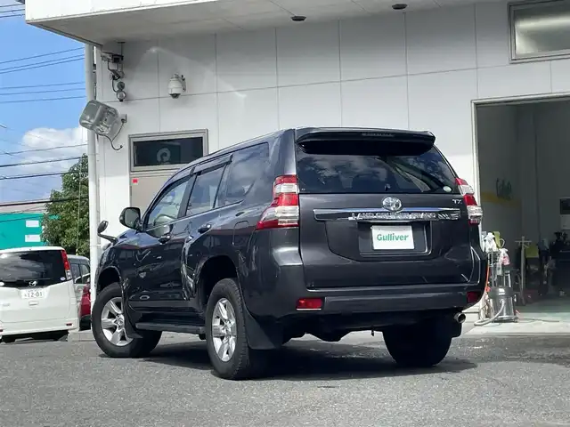 トヨタ ランドクルーザー プラド TX Lパッケージ 宮城県 2015(平27)年 12.2万km グレーメタリック 純正ナビ/　CD/DVD/　FM/AM/　フルセグテレビ/　Bluetooth/エンジンスターター　/４ＷＤ　/７人乗り３列シート/自動収納サードシート/ターボ　/純正アルミホイール１７インチ/ヒーターアイドルアップ/フロントワイパーデアイサー/ETC/センターデフロック/パワーシート/シートヒーター/クルーズコントロール/ダウンヒルアシストコントロール/横滑り防止