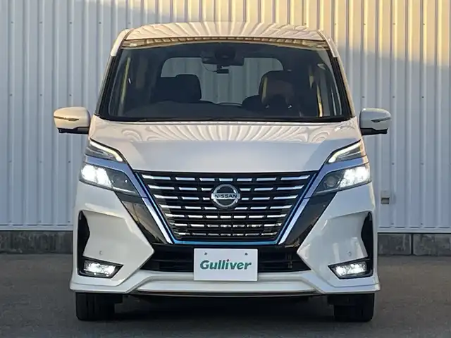 日産 セレナ e－パワー ハイウェイスター G 福岡県 2021(令3)年 8万km ブリリアントホワイトパール プロパイロット/純正９インチナビ（ＭＭ３２０Ｄ－Ｌ）/フルセグTV/CD/DVD/BT/SD/AM/FM/全周囲カメラ/デジタルインナーミラー/衝突軽減/BSW/両側パワースライドドア/ドラレコ/ビルトインＥＴＣ/純正１６ＡＷ/ＬＥＤオートライト/電動パーキング/ブレーキホールド/スマートキー/プッシュスタート/ロールサンシェード/シートバックテーブル