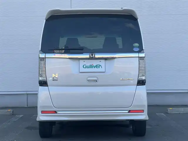 ホンダ Ｎ ＢＯＸ カスタム G ターボ Lパッケージ 秋田県 2017(平29)年 12.7万km プレミアムホワイトパールⅡ 社外ナビ/４WD/スマートキー/両側パワスラ/ターボ/フルセグ/前席シートヒーター/社外アルミ/社外フロアマット/ETC/ステアリングスイッチ/フリップダウンモニター/アイドリングストップ/プッシュスタート/オートライト/オートエアコン/パドルシフト/横滑り防止/純正ドアバイザー/オートエアコン/オートライト/パワーステアリング/パワーウィンドウ/電動格納ウィンカーミラー/フルフラットシート/チップアップシート/保証書/取扱説明書/記録簿