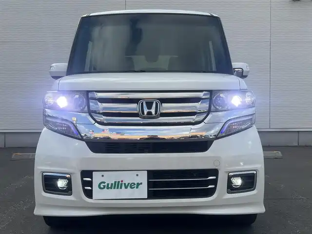 ホンダ Ｎ ＢＯＸ カスタム G ターボ Lパッケージ 秋田県 2017(平29)年 12.7万km プレミアムホワイトパールⅡ 社外ナビ/４WD/スマートキー/両側パワスラ/ターボ/フルセグ/前席シートヒーター/社外アルミ/社外フロアマット/ETC/ステアリングスイッチ/フリップダウンモニター/アイドリングストップ/プッシュスタート/オートライト/オートエアコン/パドルシフト/横滑り防止/純正ドアバイザー/オートエアコン/オートライト/パワーステアリング/パワーウィンドウ/電動格納ウィンカーミラー/フルフラットシート/チップアップシート/保証書/取扱説明書/記録簿